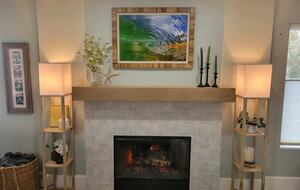 Cozy updated fireplace for cool coastal evenings