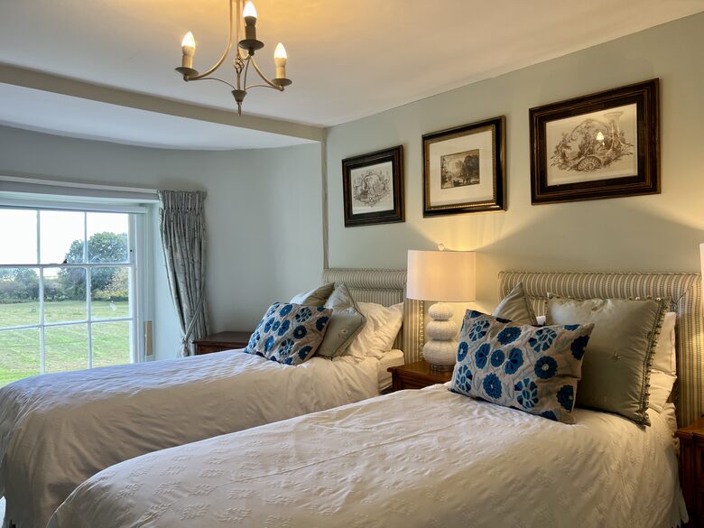 Bedroom 5 - with en suite and river & meadow views