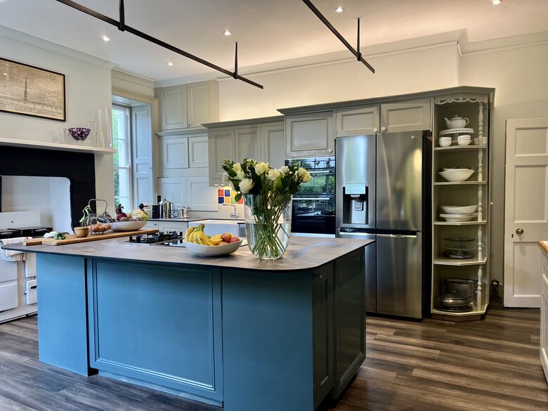 Kitchen open plan to breakfast room with table and sofa