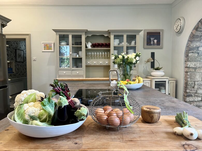 Kitchen open plan to breakfast room with table and sofa