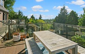 Expansive back porch with water views