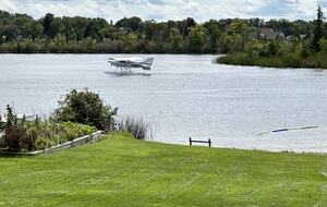 Watch the sea plane take off and land, an awesome sight!