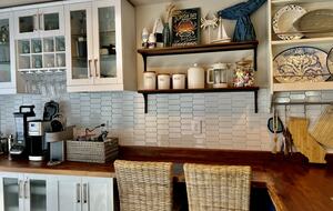 Breakfast bar seating for two in kitchen.