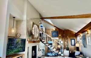 Looking from living room to stairway and bedrooms.