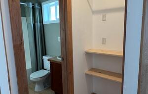 Lower level bathroom #3 with small bathtub