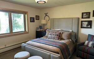 Lower level queen bedroom with ensuite bath