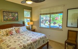 Main floor bedroom with adjacent bathroom