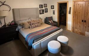 Lower level queen bedroom with ensuite bath