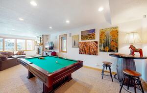 Fun basement with pool table. And bar. And shotski!