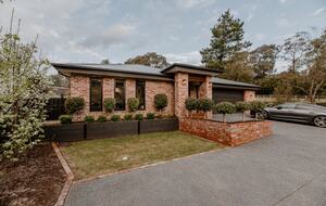 Badger House streetscape with extensive carparking