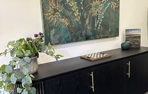 Buffet with Board & card games and books for fireside fun