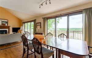 Formal dining area, deck and river