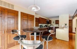 Informal dining and open kitchen fully stocked