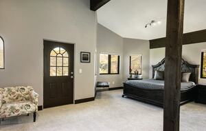 Master bedroom with deck overlooking valley