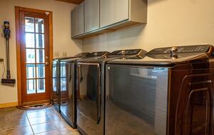 Laundry Room - Main Floor - 3 Dryers, 2 Washers, Fridge