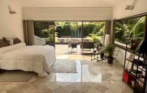 Huge Master bedroom with TV area and 55”HDTV