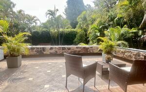 Master bedroom with terrace and pool view
