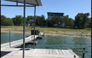 This image is from old dock. Shows back yard and the house