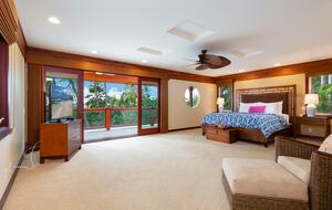 Primary bedroom with outdoor balcony/lanai