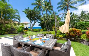 Outdoor dining area with grill