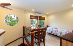 Upstairs Office area with a twin bed