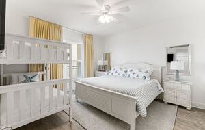 King bed with bunk beds, bay view and on-suite bathroom