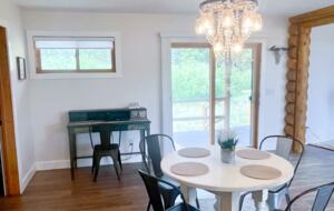 Desk area and round table to seat 5