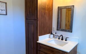 Upstairs full bathroom with tub