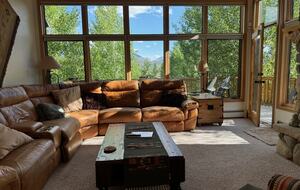 Our couch in the living room RECLINES - you'll want to stay