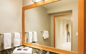 Main Floor Bathroom adjacent to Queen Room