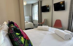 Bedroom 2 with large wardrobe and Smart TV