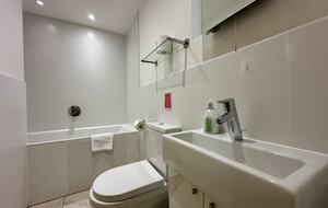 Second bathroom with over-bath shower