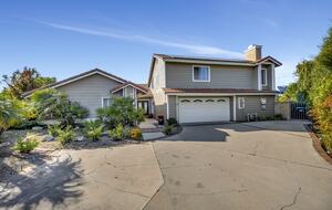 Long driveway that can accommodate 4-5 cars plus one in garage.