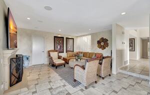 Family room w/fireplace.