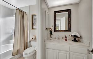 Bathroom 3 with shower and soaking tub.