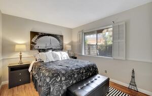 Paris room with queen bed.