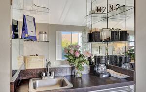 Coffee/tea station plus mini frig in primary.