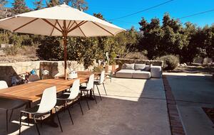 Front Patio, Large Dining Table and Sofa adjacent to orchards