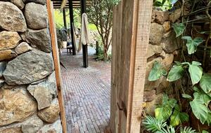 View to the terrace from the outdoor shower