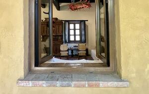 View to the living room from an outdoor hall