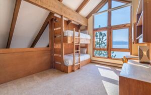 Loft with bunk beds and desk