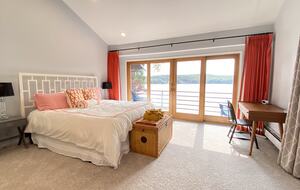 Primary Bedroom with lake views