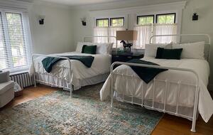 Front bedroom with 2 double beds and en suite juccuzzi tub