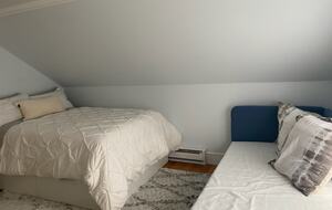 Side room with double bed, single bed, en suite bath and balcony