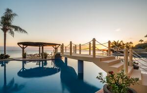 Olympic sized infinity pool directly on beach of Banderas Bay