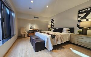 Bedroom 2 opens to patio with fountain pool