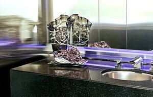 Power Room with stainless steel walls and Neon lighting