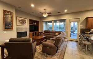 Family room, fireplace sectional, recliner, large screen TV, streaming