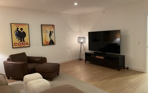 Media room with 80” TV and Sonos surround