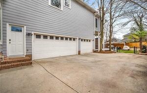 Dedicated garage space for one car and an additional secured space
